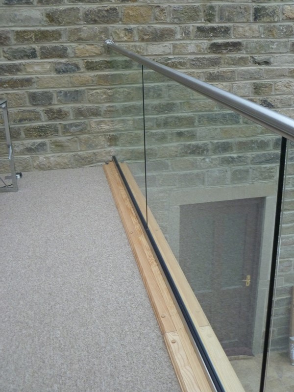 Stainless steel and glass balcony for home office